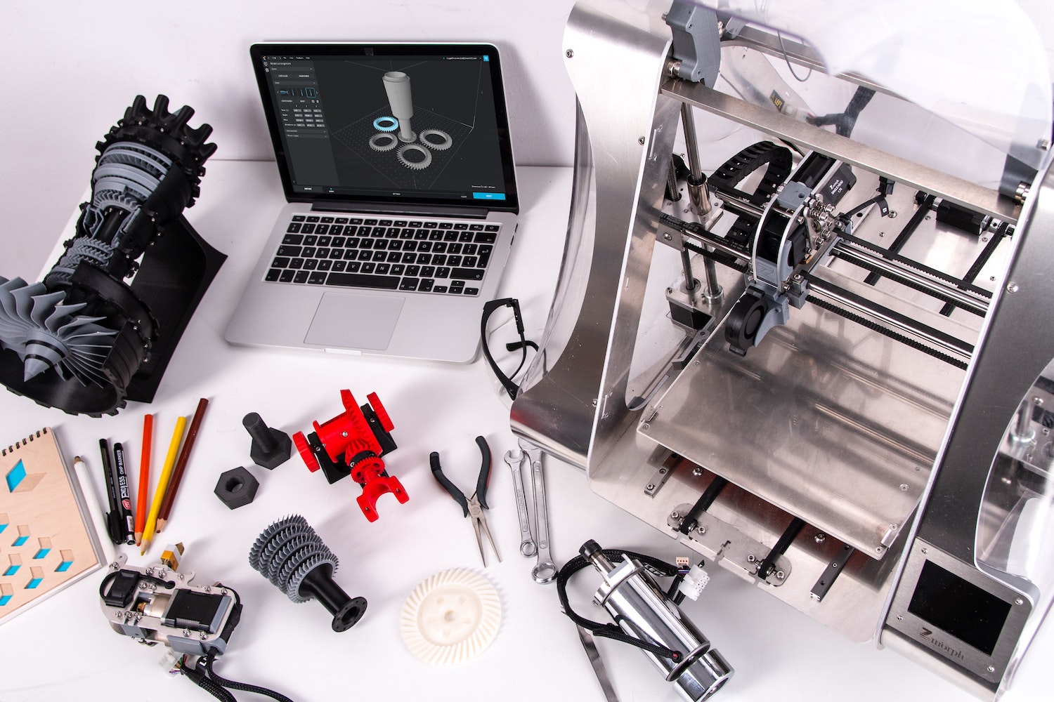 Picture showing a messy desk with all kinds of tools for prototyping purposes